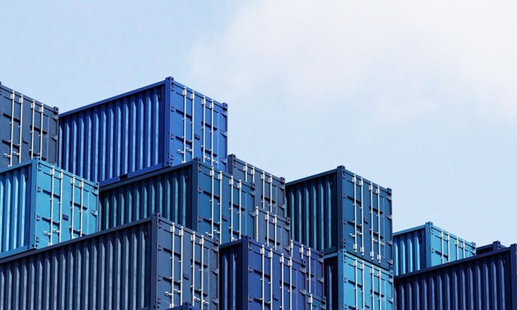 Shipping containers representing international freight and supply-chain connections